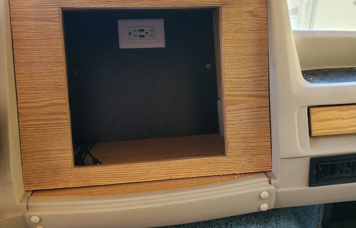 Front media charging/storage station