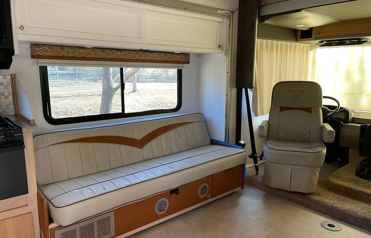 Living room couch that folds down flat.