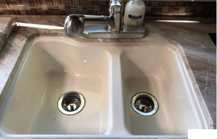 Kitchen sink with cover off