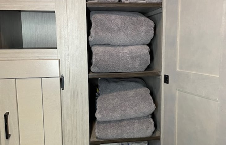 Bath, hand, and dish towels are all provided as well as a hair blow-dryer, first-aid kit, and bear spray, just in case!