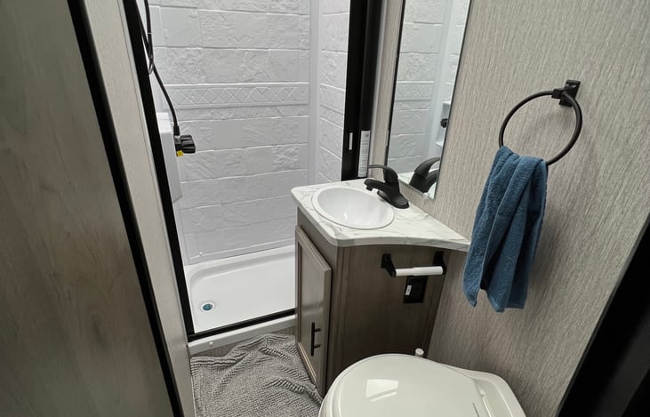 Bathroom with separate shower area