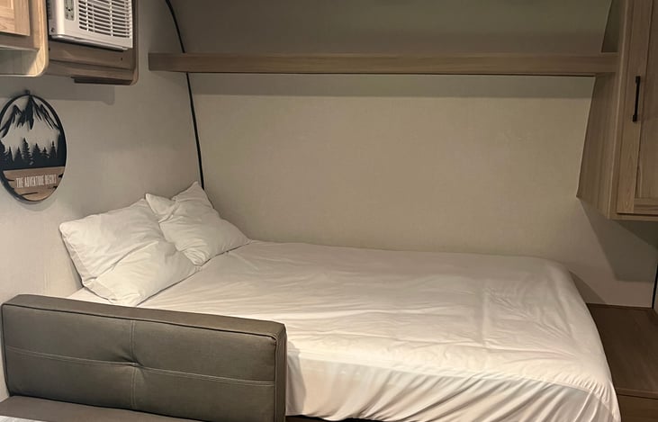 Queen bed, two pillows & bed sheet