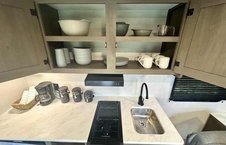 Kitchen is equipped with your basic needs.