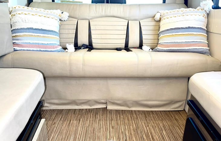 Rear Sofa with 3 Seat belts. This converts to a queen-size bed.