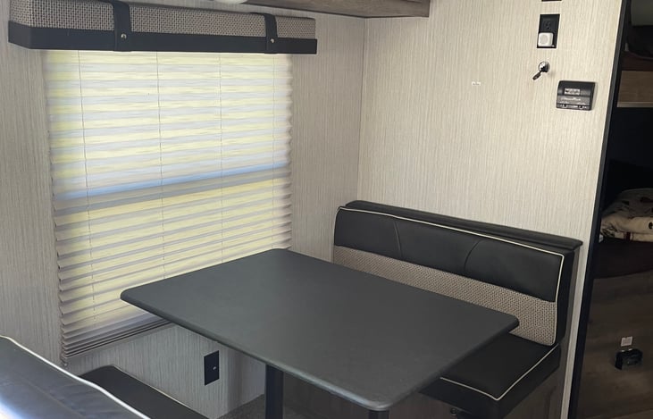 Dining area/ table makes into bed