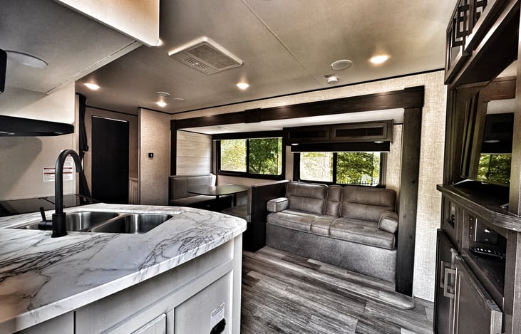 Dining table and sofa both turn into additional beds! Tv has Roku built in.