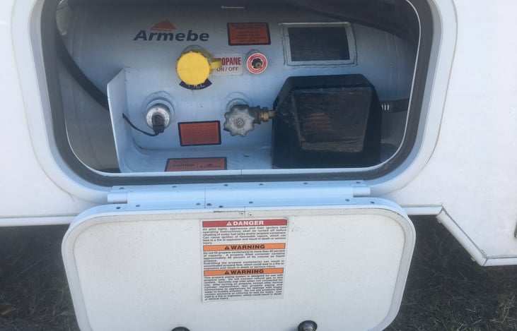 On board LP Propane tank for in house cooking 
Hot water heater and to keep fridge cold