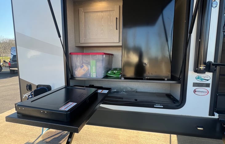 Outdoor kitchen (two gas burners on the stove and mini-fridge)