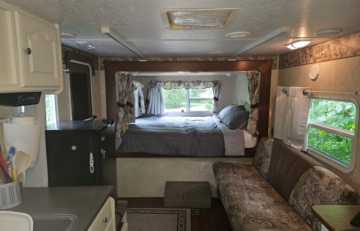 Bed comes made and extra fridge