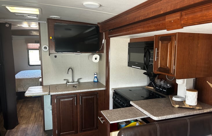 Extended countertops. Plenty of room to prepare a meal. Includes dish soap, sponge, hand & paper towels, trash bags, pots/pans, utensils, cooking utensils, pot holders, ziploc bags, foil, etc.
