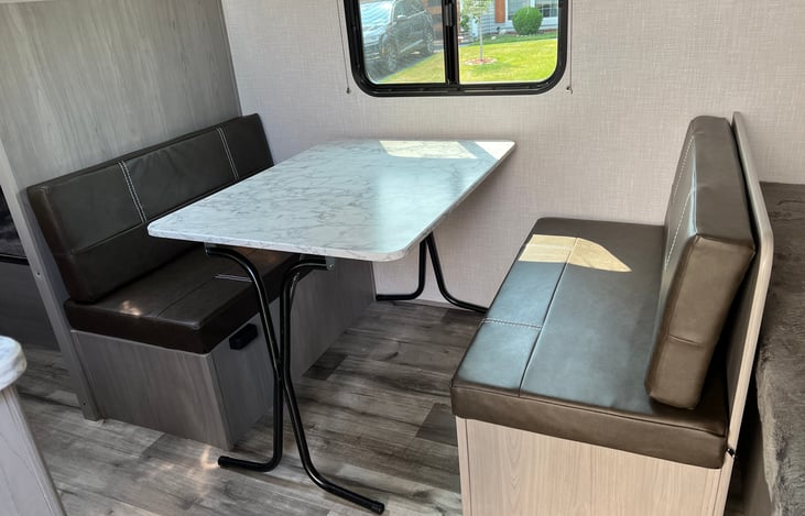 Dinette with removable picnic table - no need to pack a separate one for the campsite!