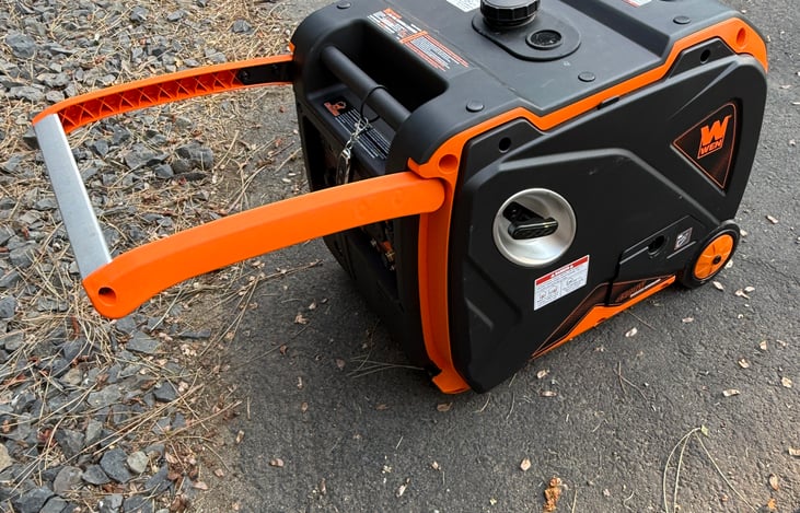 Generator with wheels, pull handle and wireless on/off remote