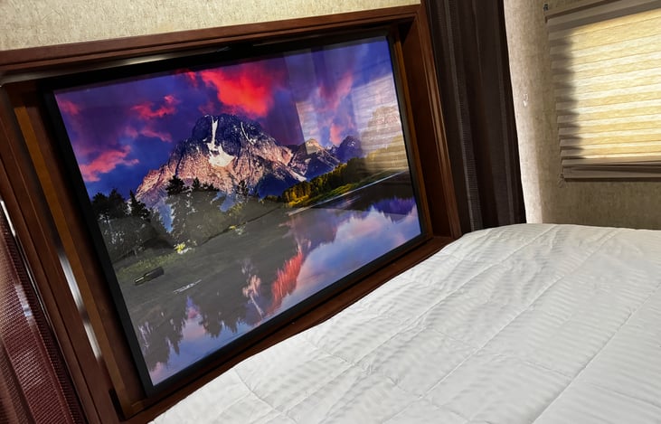 Master Bedroom-twist around TV/Photo Console-with updated New TV.