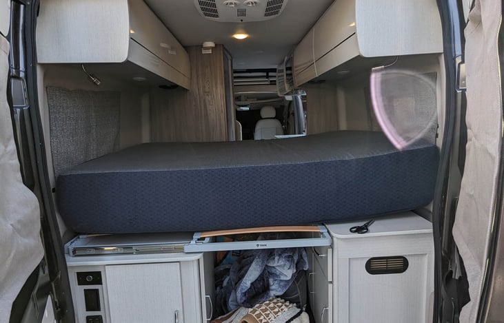 This is the new bed that we purchased for the van. Way more comfortable than the seat cushions that come standard with a camper van!