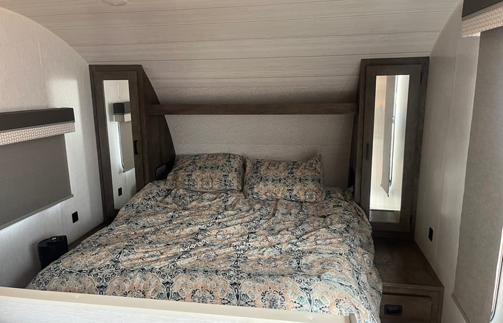 Queen sized bed with separate closets. Has outlets in the closets and usb ports on side of bed. Storage also underneath bed.
