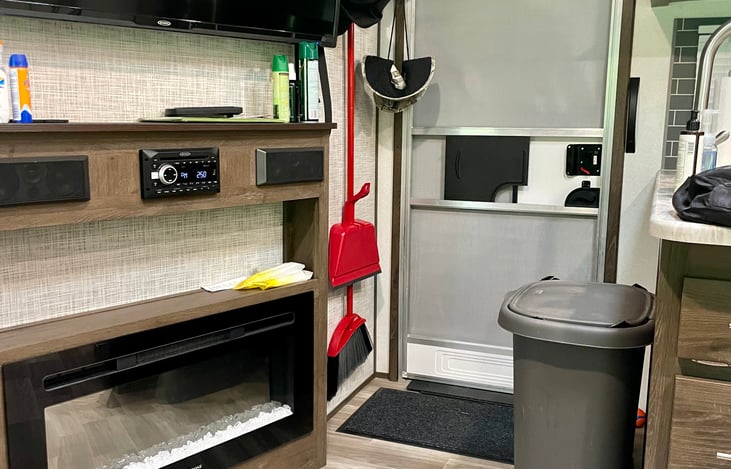 Front Entrance with 55" TV and Electric Fireplace.