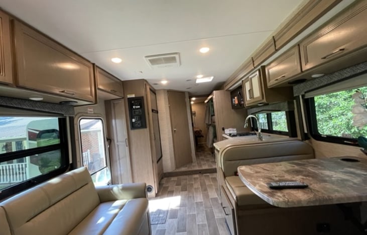 Living/Dinging/Kitchen, each turn into beds.