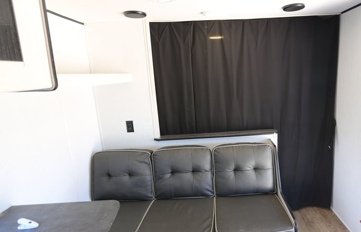 sofa with bedroom curtain