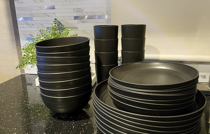 Dishes and kitchen utensils provided