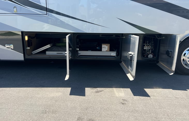 Pass through storage compartments