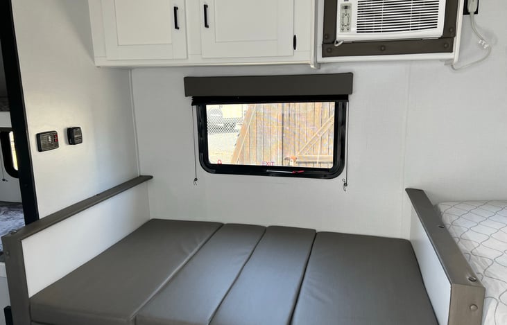 converted dinette area into bed with A/C