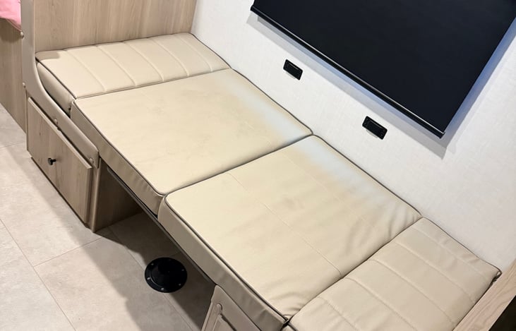 The dinette converts to a bed, which is how the Geo Pro sleeps up to six.