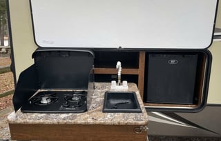 Enos - SOUTHEAST CAMP & TRAVEL, LLC