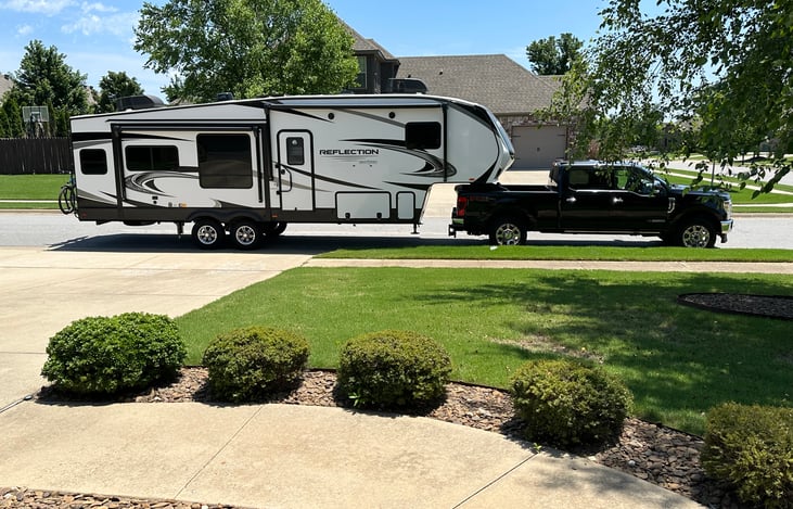 Connected to my King Ranch F250 specifically outfitted to pull the camper with ease, RV Garmin, air bags, heavy duty suspension, and 50 gallon diesel tank.