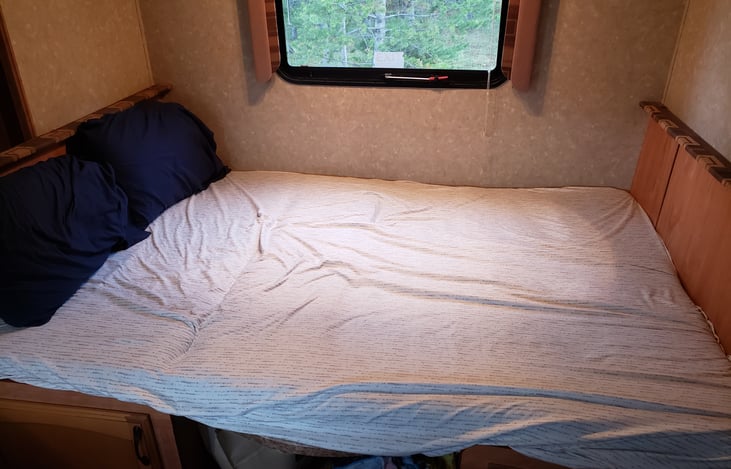 Dinette converted into a full size bed.