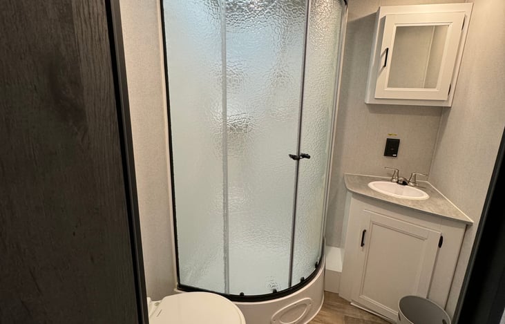 spacious bathroom, full shower