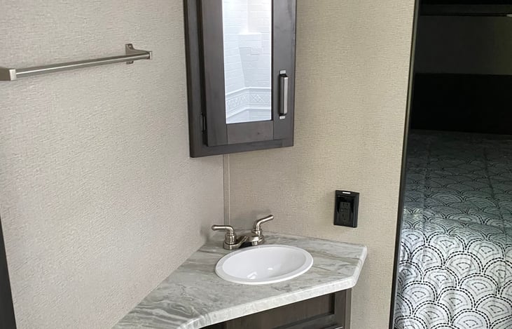 Bathroom sink , and above medicine cabinet , gfi plug for blow dryer, etc …….