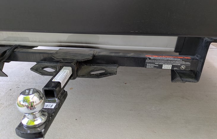 1" hitch with 1-7/8" ball. Note: Not standard 2" ball. tow weight is only 2000 lbs. (907 Kg) and tongue weight is only 200Lbs (91Kg) Meaning bike rack Plus all bikes Max weight 200 lbs.