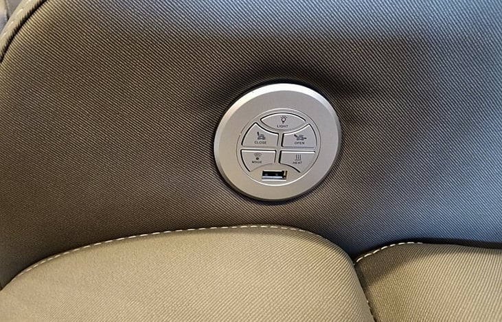 Two reclining seats facing the TV with heat and massage.