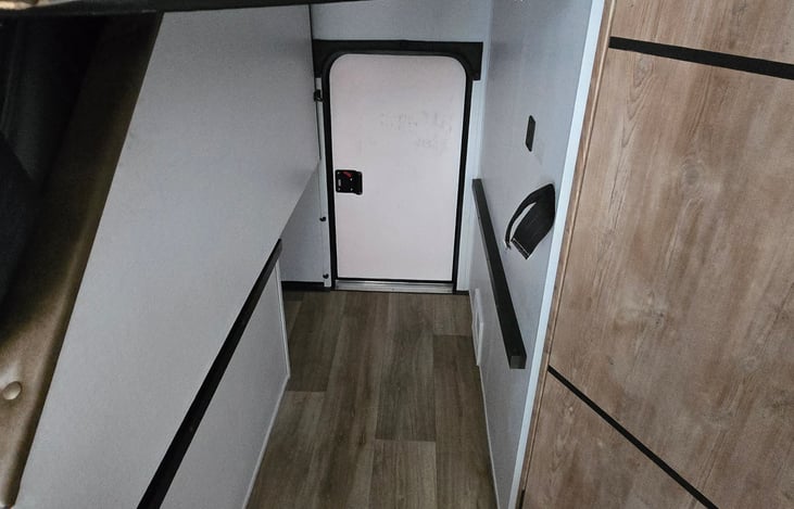 Bottom bunk folds up for bigger items that need to put in the back.