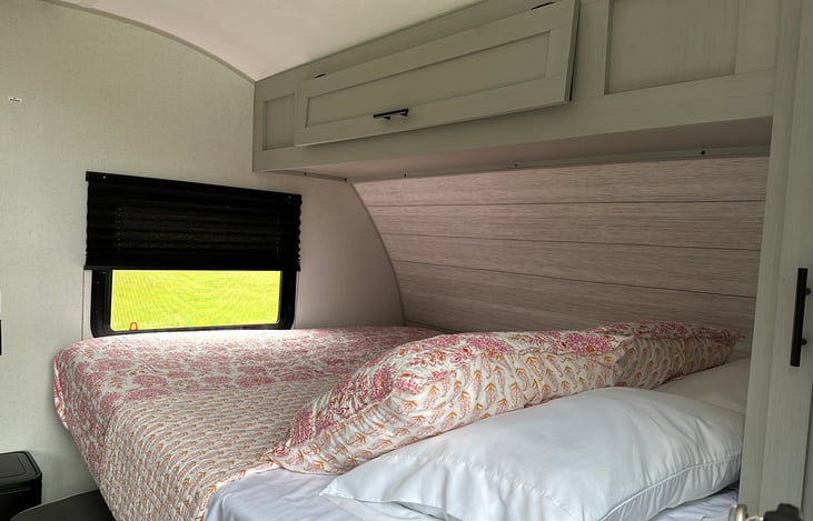 Camper Queen folds up to a couch