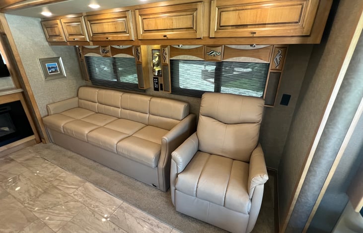 Couch has an hide-away air mattress bed