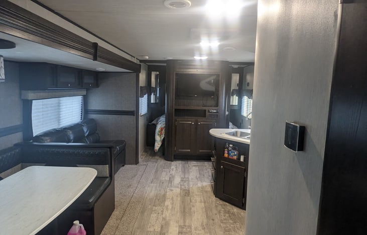 Looking towards the master with bunks behind, and bathroom on right