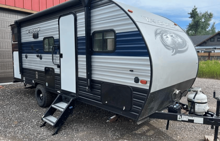 Entrance with easy set up stairs and access to storage.