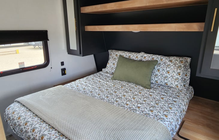 Private bedroom with tons of storage and soft bed sheets.