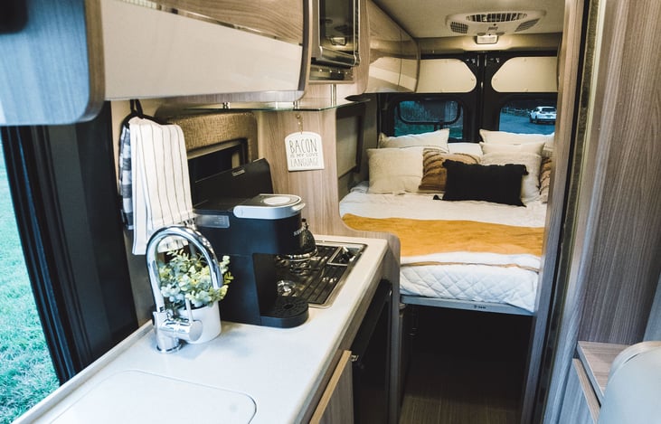 Stainless steel sink covered up with cutting board!