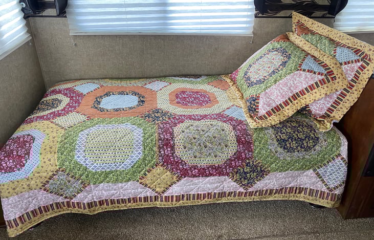 Futon Couch Conversion  (sleeps 1 adult or 2 kids) All linens and pillows included.