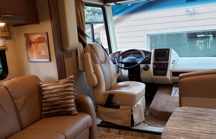 Bunk above seats in front.