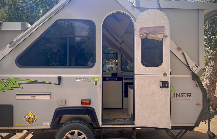 Front entrance of the Aliner pop top rental at KOA Boulevard