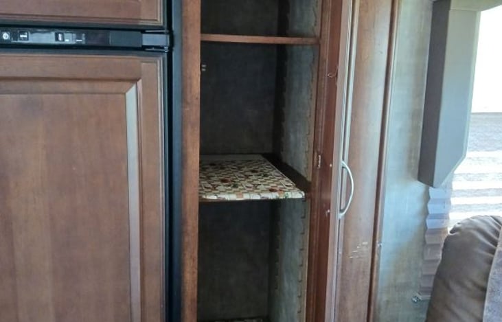 Kitchen storage with over head storage too!