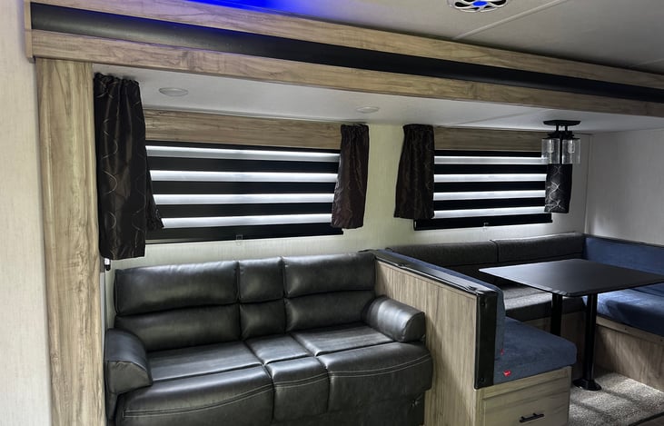 Sofa folds down for additional sleeping, as does the large dinette.