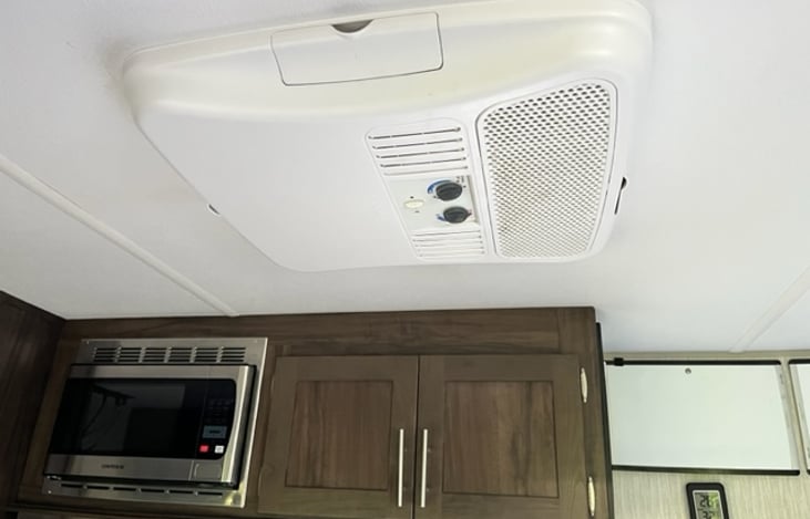 13,500 BTU AC can cool Miss Blue to the upper 60's even when it in the 90's outdoors