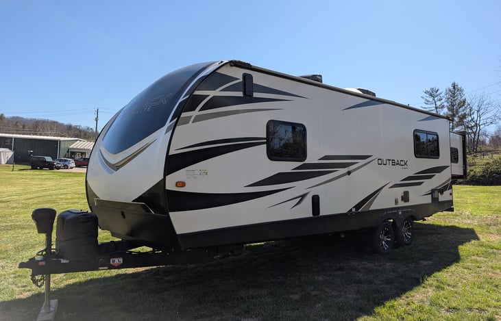 Outback Ultra Lite is a great toy hauler model with all the modern amenities you will need for your trip. At 28 feet long, it is easy to tow as well.