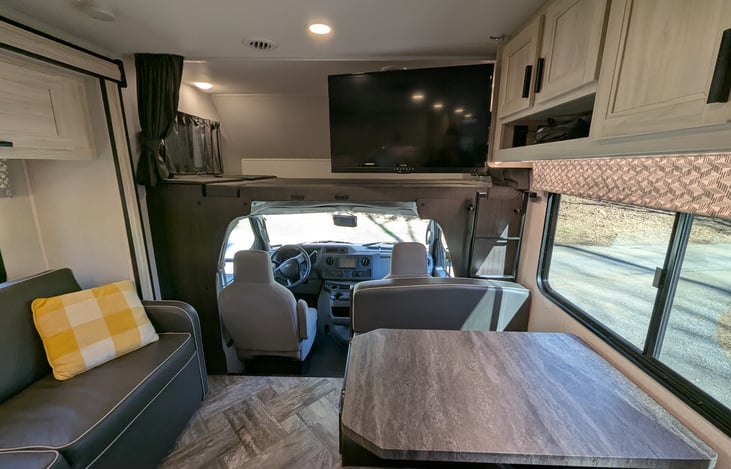 Spacious, bright & modern interior. Well-stocked kitchen with stove-top and convection microwave. Comfy couch and dinette both convert to beds. Large overhead bunk with swing-out TV for entertainment.