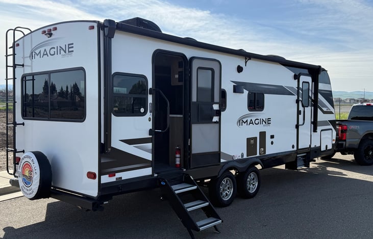 This trailer has a great open floor plan, and two doors that lead outdoors. It also has a new awning, screen doors and many windows for fresh air.
