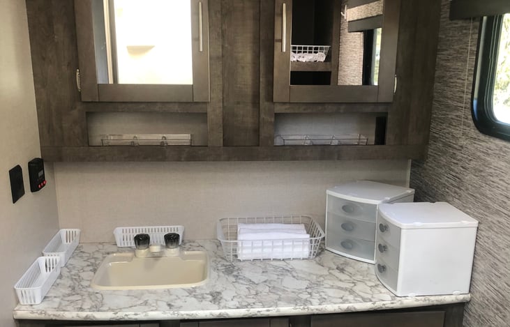 Bathroom has double mirrors